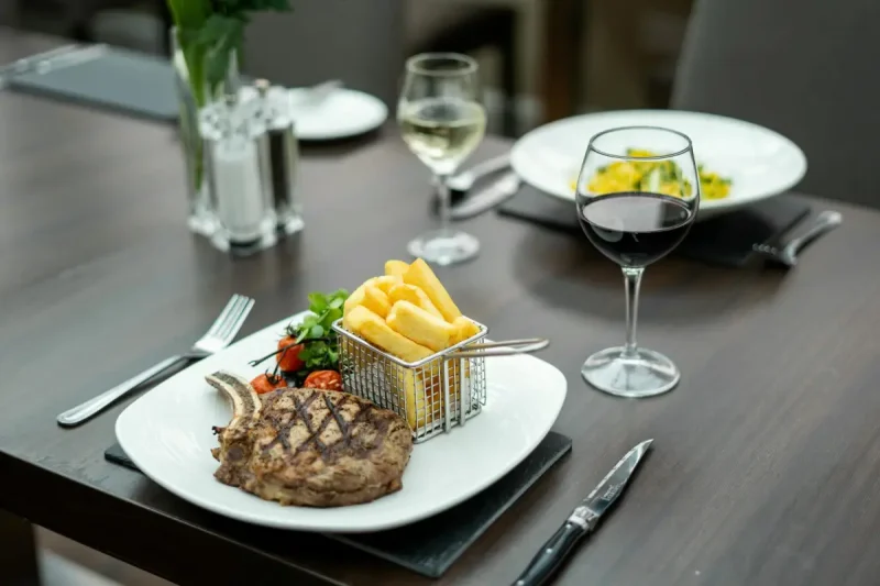 Duchally Country Estate restaurant meal: steak, salad and french fries